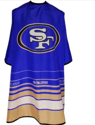 The Blue San Francisco 49ers Barber Cape is a bold and stylish barber cape designed to bring a fresh, modern, and sporty look to your workspace. Featuring a rich blue color combined with the iconic 49ers logo, this cape delivers a unique twist on classic team style while keeping your clients fully protected during every haircut.
